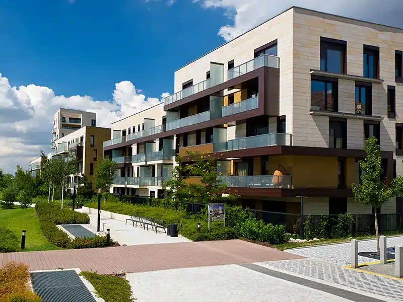 Buying Property A new, modern apartment complex.