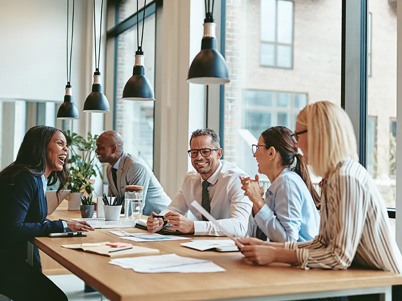 Property Management A group of professionals having a business meeting.